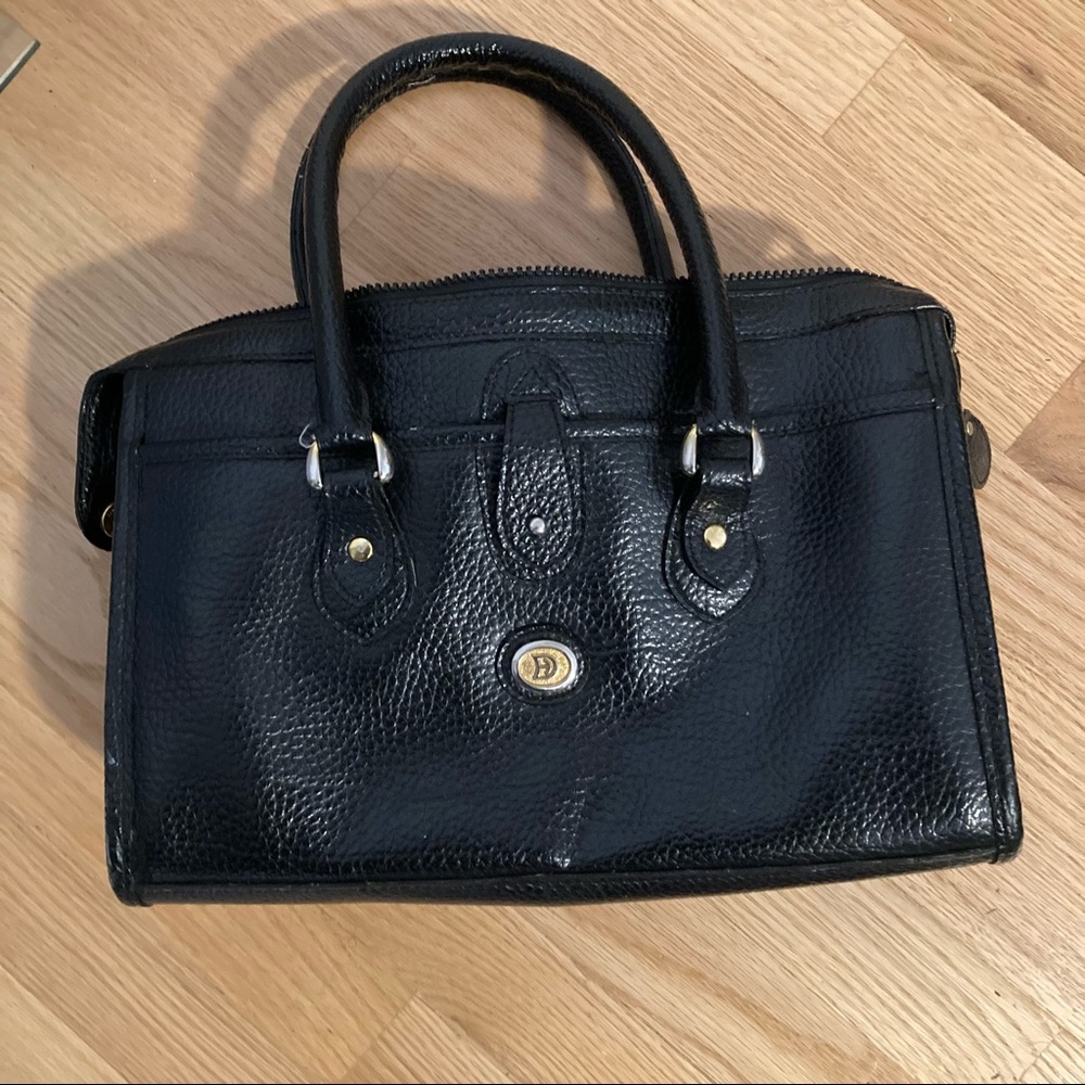 Black vintage leather purse.